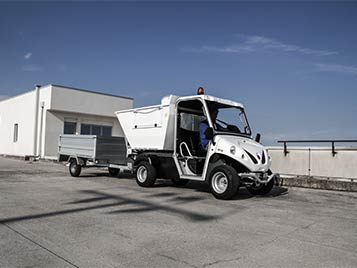 Trash collection with trailer