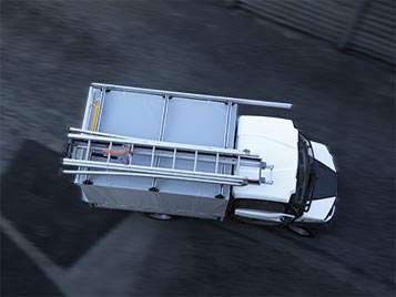 Tarpaulin van with ladder racks