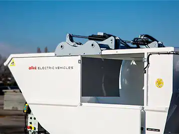 Waste collection body with rear loader with compaction system