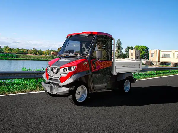 Electric utility vehicles with loading bed