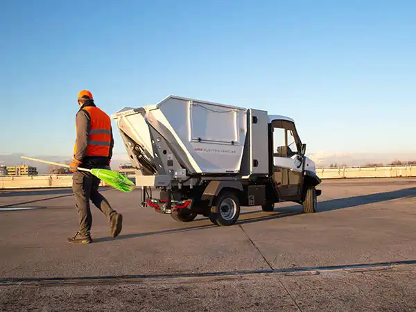 Waste collection vehicle with toolbox